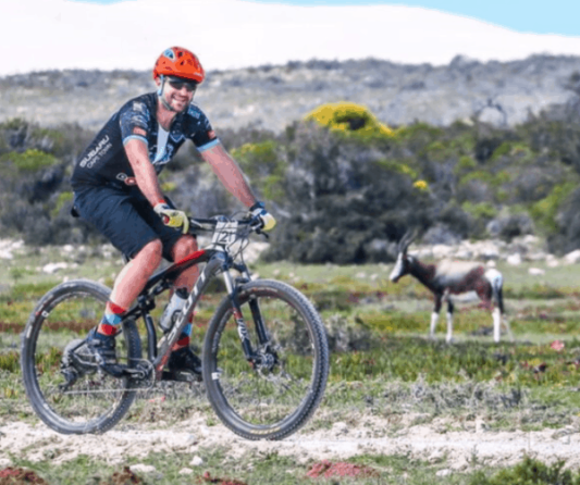 Cyclist and antelope- Whale Coast
